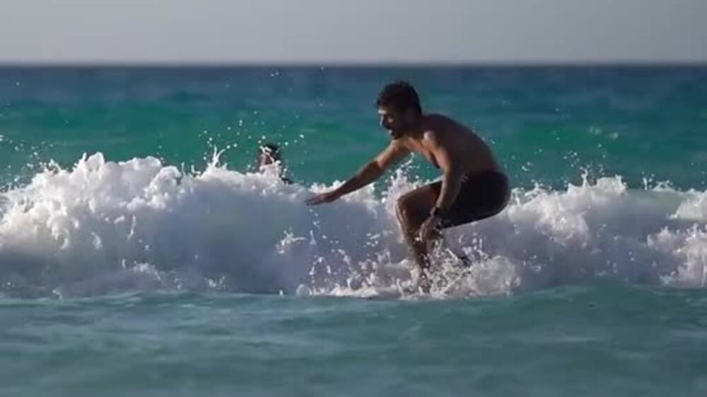 Surfing hits the summer season in Egypt's North Coast