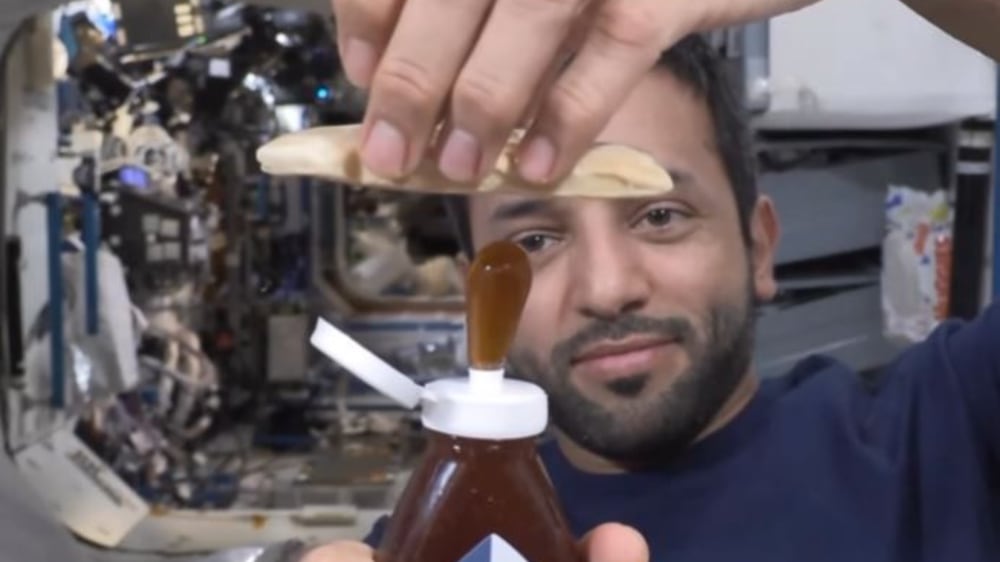 UAE astronaut Sultan Al Neyadi shows what happens to honey in space