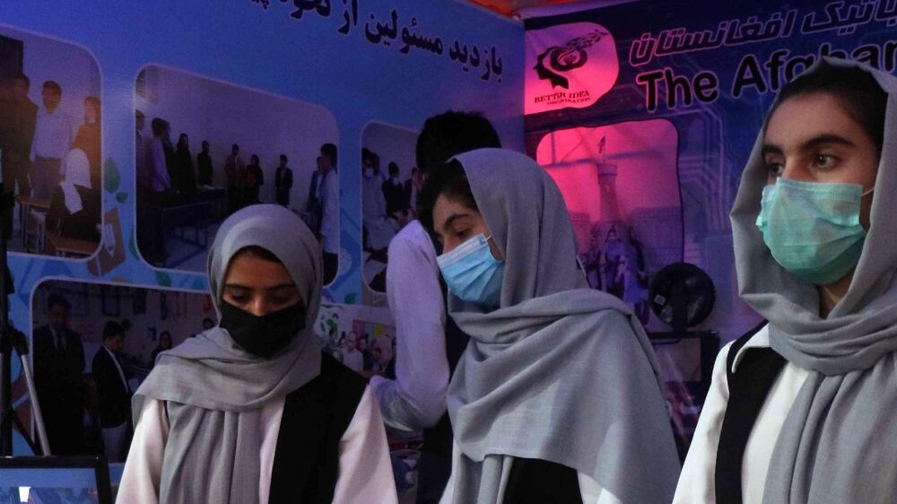 Afghan all-girl robotics team show their projects at an exhibition in Herat, Afghanistan, 04 July 2021.  The exhibition features traditional handicrafts and items produced in the country.   EPA / JALIL REZAYEE