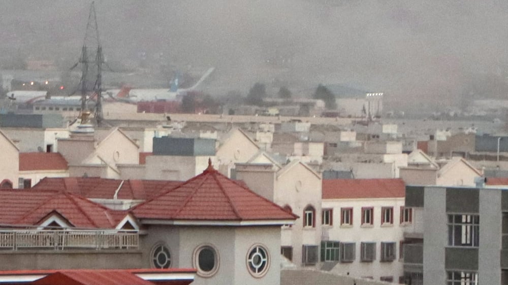 Two blasts near Kabul airport as evacuations continue