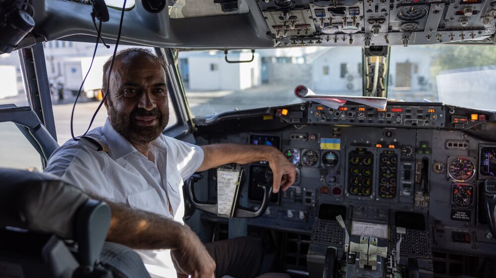 ���This is my second flight under the flag of the [Islamic] Emirate,��� said Bakhtar Airlines captain Abdul Qader Alozay, sitting in the cockpit with his first officer minutes after touchdown. Stefanie Glinski for The National