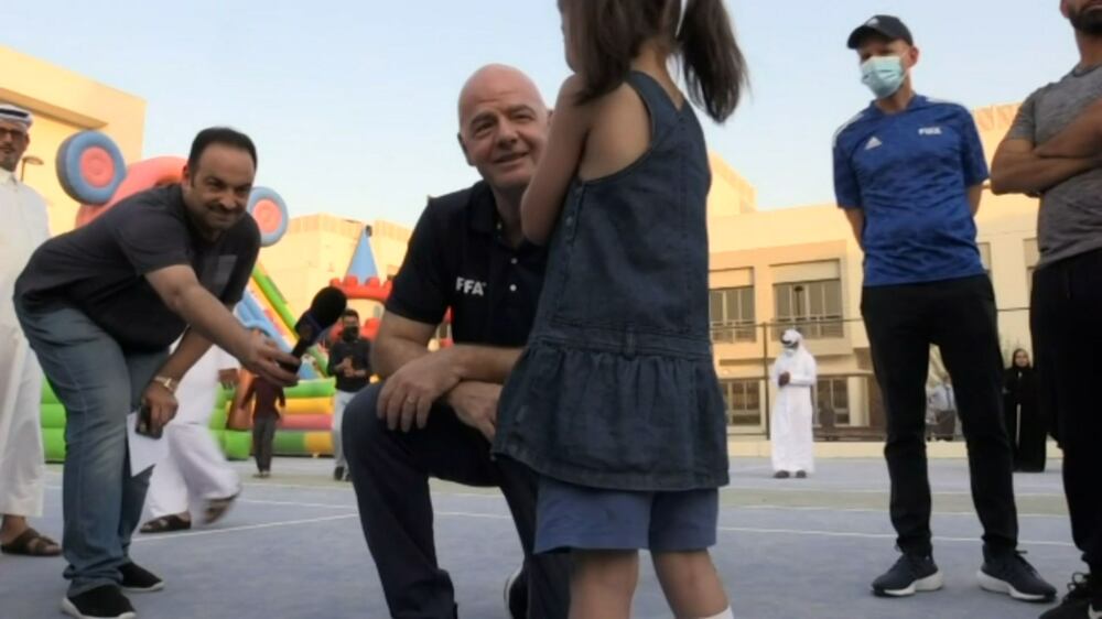 Fifa president visits Afghans living at World Cup complex