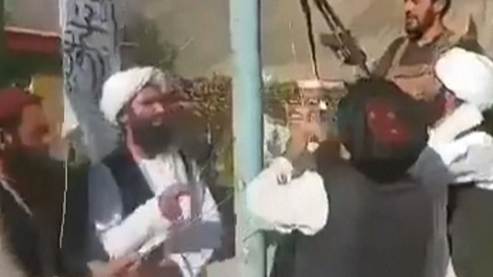 Taliban raise flag in Panjshir, but resistance forces say fight continues