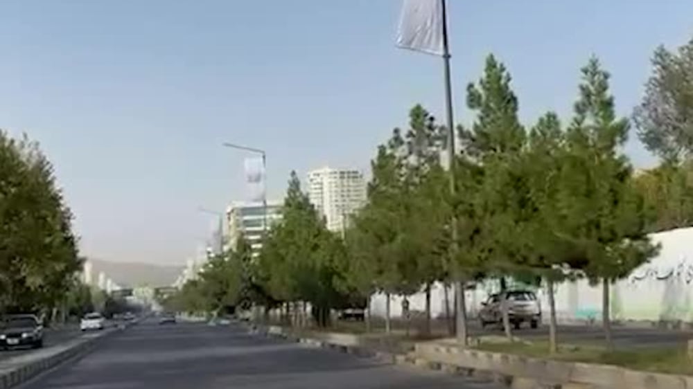 White Taliban flags flutter over Afghanistan's capital, Kabul