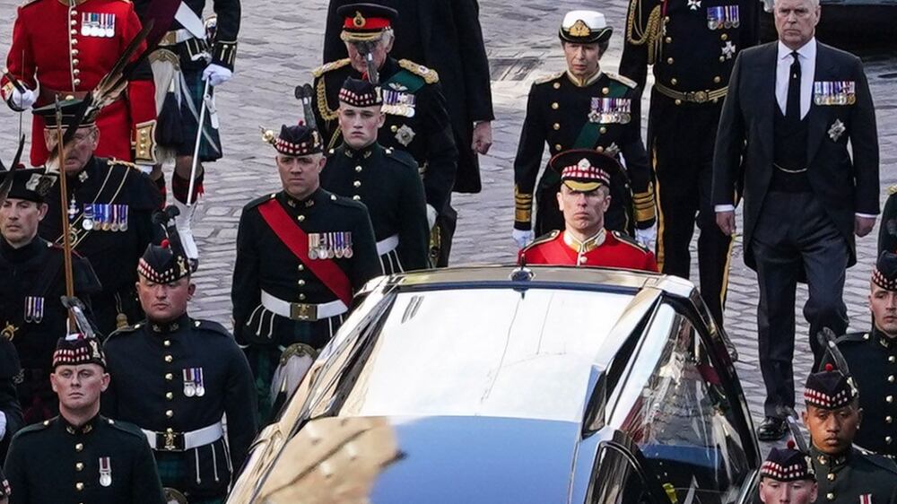 King Charles III leads procession behind queen's coffin in Edinburgh