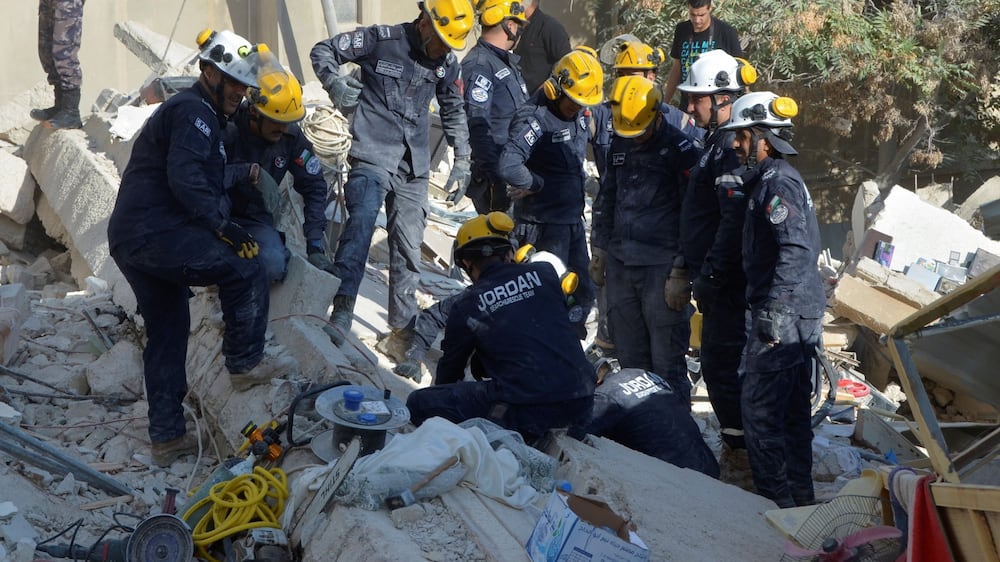 Jordan building collapse: at least ten trapped under rubble in Amman