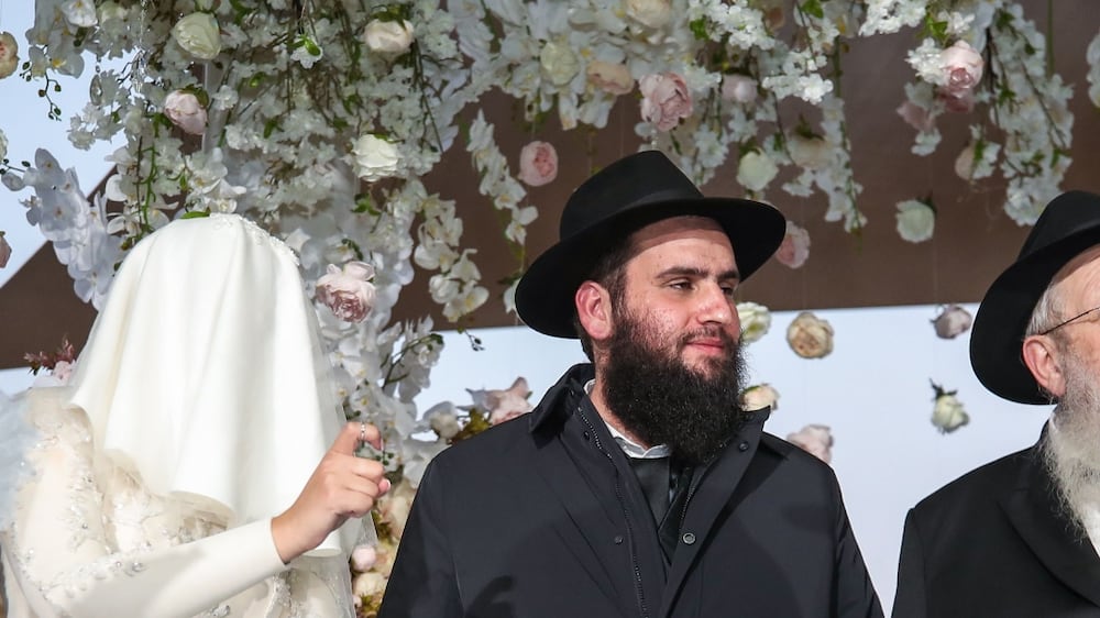 With 1,500 guests from around the world, including leading rabbis, dignitaries and Emirati royals, the wedding of Lea Hadad and UAE Rabbi Levi Duchman is the largest Jewish event in the history of the Emirates. Rabbi Duchman, with support from the government, has built much of the country’s Jewish infrastructure that has seen the burgeoning Jewish community flourish. Victor Besa / The National