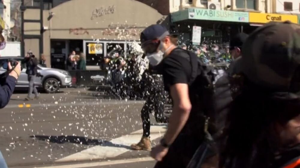 Footage goes viral after Melbourne police use pepper spray on anti-lockdown protesters