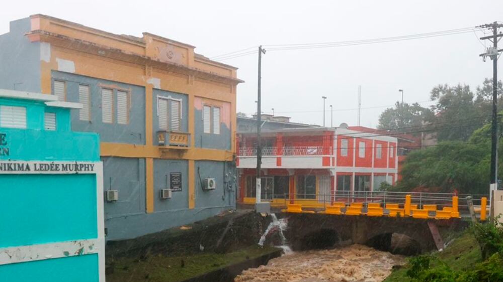 Hurricane Fiona floods sweep away bridge in Puerto Rico