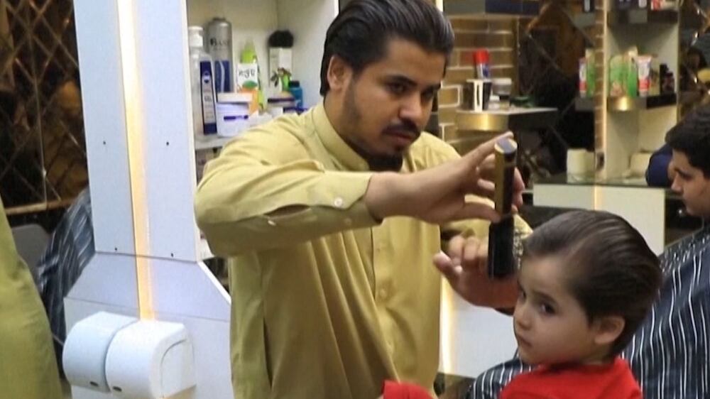 Business declines for barbers under Taliban rule as Afghans shun fashion