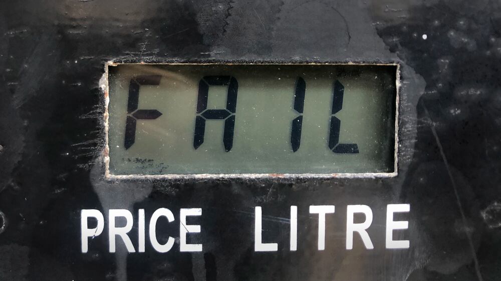 A screen on a gasoline pump reads, "Fail," after the latest increase in fuel prices with most meters unable to accommodate the new five digit price for one liter of gas, in Beirut, Lebanon, Wednesday, Sept.  22, 2021.  The technical problem forced most gas stations to shut down, despite the long queues of vehicles waiting to fill up their tanks.  Lebanon's new government raised the price of fuel on Wednesday by 16%, the second time in five days, part of a gradual lifting of subsidies in the crisis-struck country.  (AP Photo / Hussein Malla)