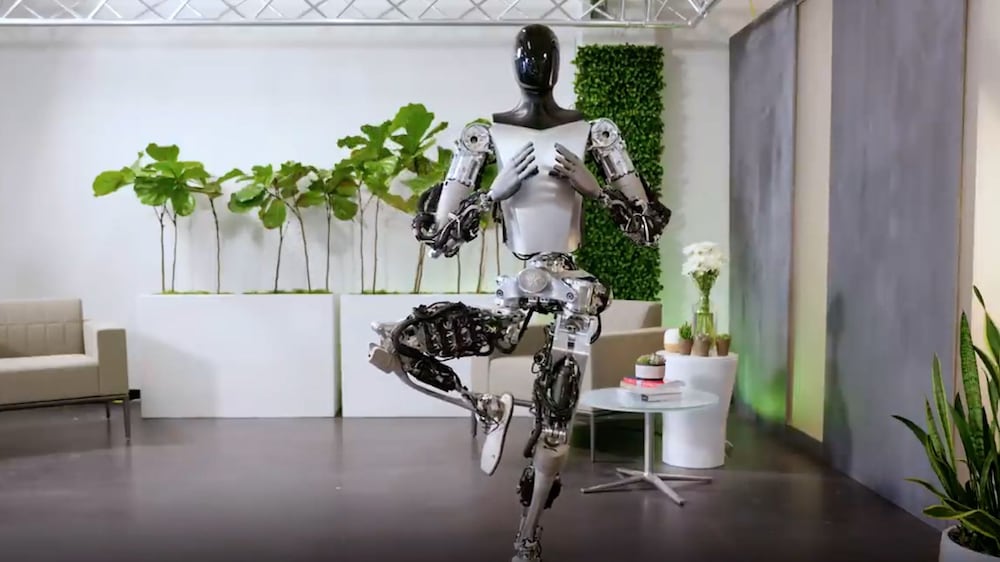 Tesla's Optimus robot strikes yoga pose in new video
