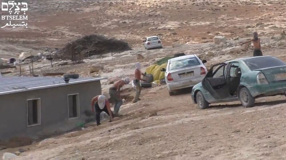 Masked Israeli settlers attack Palestinian village, wounding several including toddler