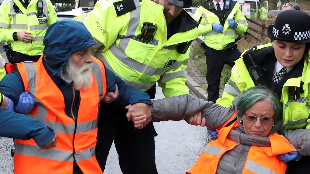 Climate activists block London Heathrow Airport access road