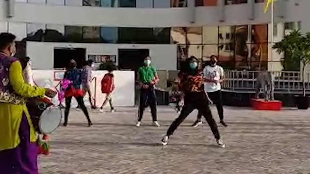 Dubai school teachers dance to welcome pupils to classrooms