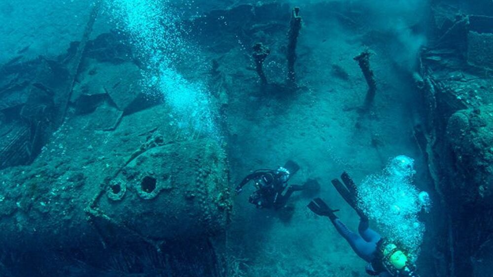 Divers visit wreckage of a battleship that sunk in the World War I Gallipoli Campaign off the coast of Canakkale, Turkey in this undated handout photo.  Directorate of Gallipoli Historic Site/Handout via REUTERS ATTENTION EDITORS - THIS PICTURE WAS PROVIDED BY A THIRD PARTY.  NO RESALES.  NO ARCHIVE. 