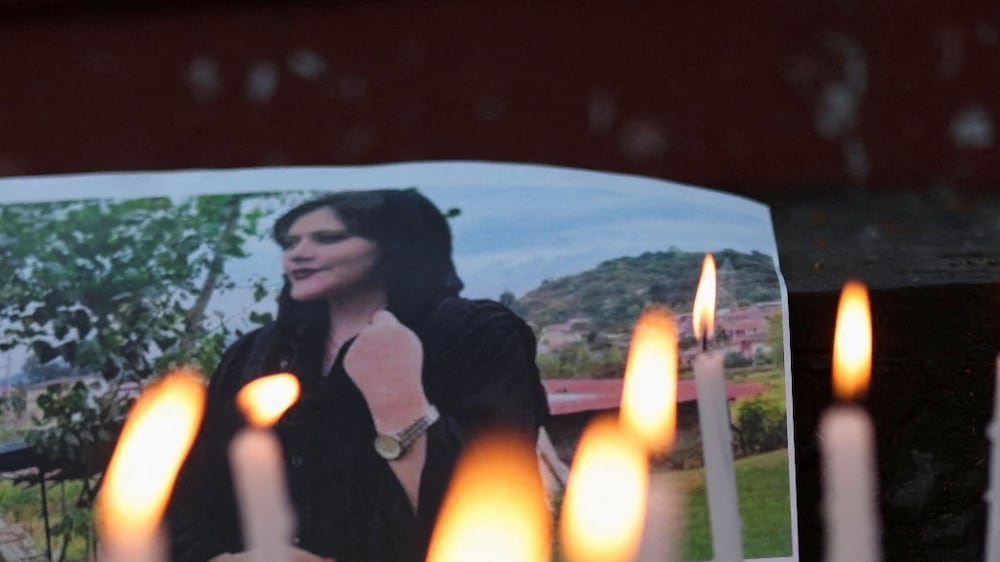 FILE PHOTO: A photo of Mahsa Amini is pictured at a condolence meeting organised by students and activists from Delhi University in support of anti-regime protests in Iran following the death of Mahsa Amini, in New Delhi, India, September 26, 2022.  REUTERS / Anushree Fadnavis / File Photo