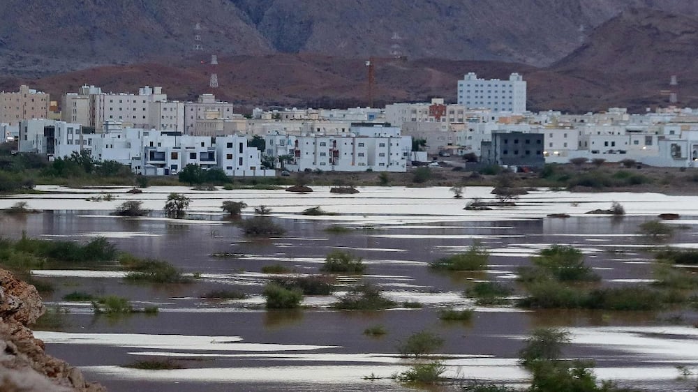 A general view shows Ansab Dam amid cyclone Shaheen in Oman's capital Muscat on October 3, 2021.  (Photo by Haitham AL-SHUKAIRI  /  AFP)