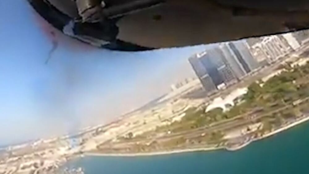 Cockpit view of Red Arrow pilot flying along Abu Dhabi's Corniche