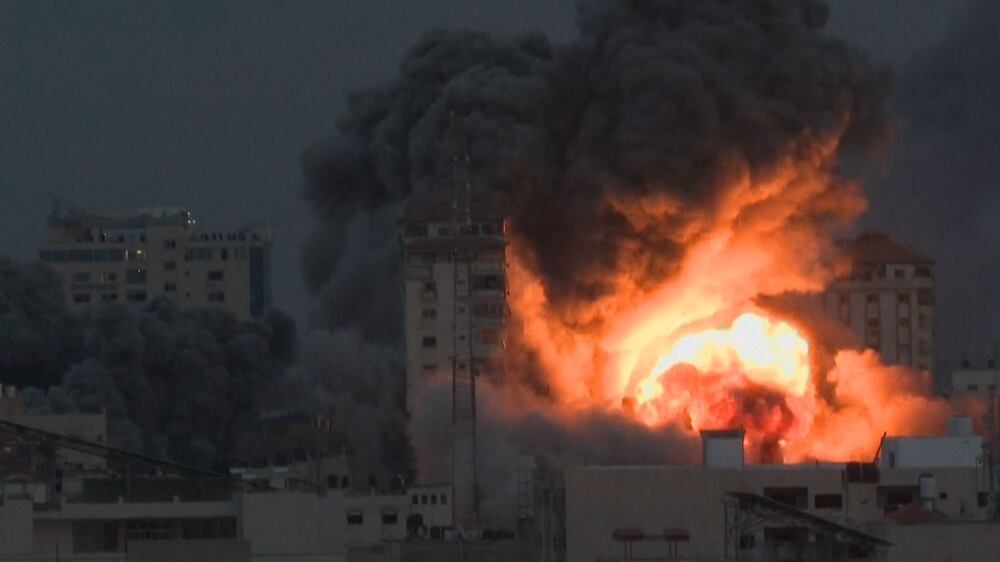 Building collapses in Gaza after Israeli air strike