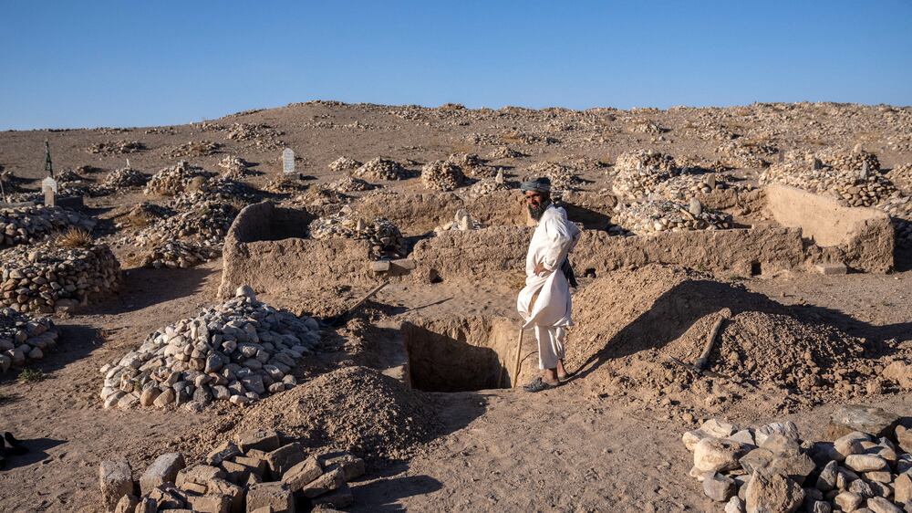 Villagers bury their dead in earthquake-hit western Afghanistan