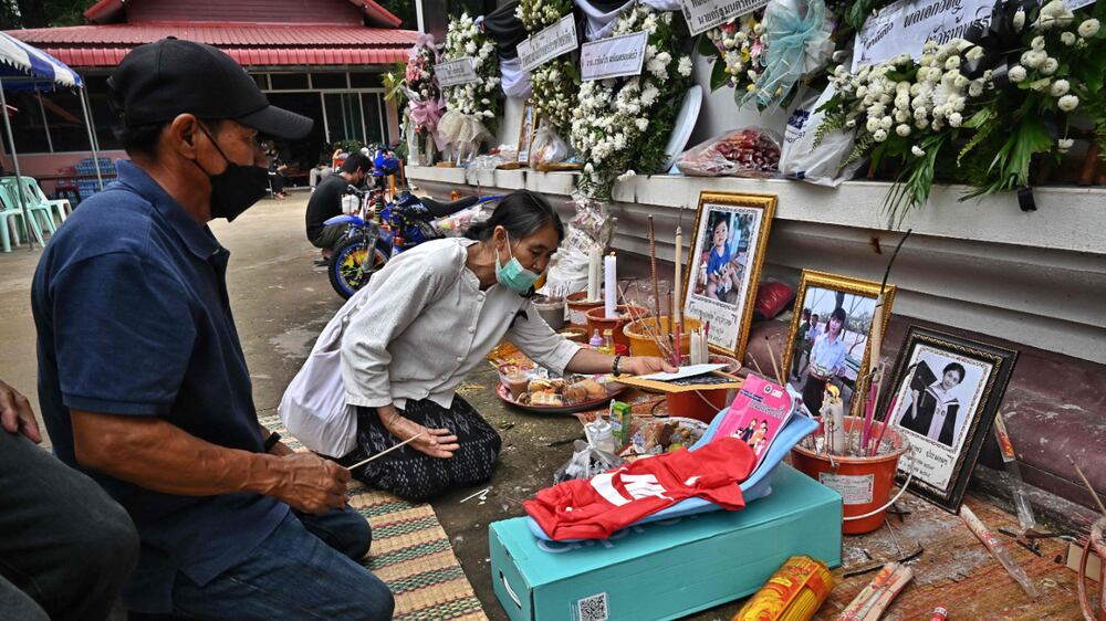 Families of Thailand massacre victims prepare for funerals