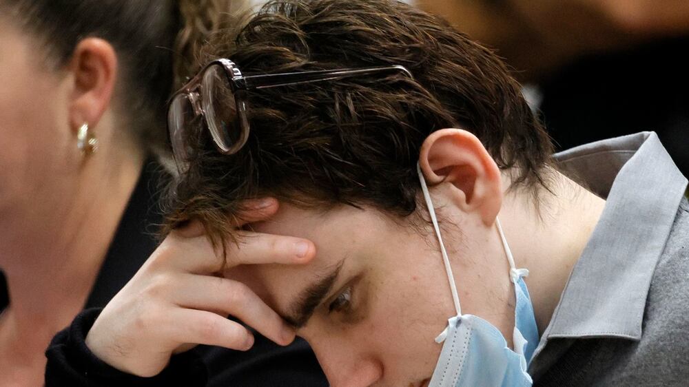 Marjory Stoneman Douglas High School shooter Nikolas Cruz is shown at the defense table during a hearing just before the jury resumed deliberations in the penalty phase of his trial at the Broward County Courthouse in Fort Lauderdale, Florida, USA, 13 October 2022.  Cruz, who plead guilty to 17 counts of premeditated murder in the 2018 shootings, is the most lethal mass shooter to stand trial in the U. S.  He was previously sentenced to 17 consecutive life sentences without the possibility of parole for 17 additional counts of attempted murder for the students he injured that day.   EPA / AMY BETH BENNETT  /  POOL