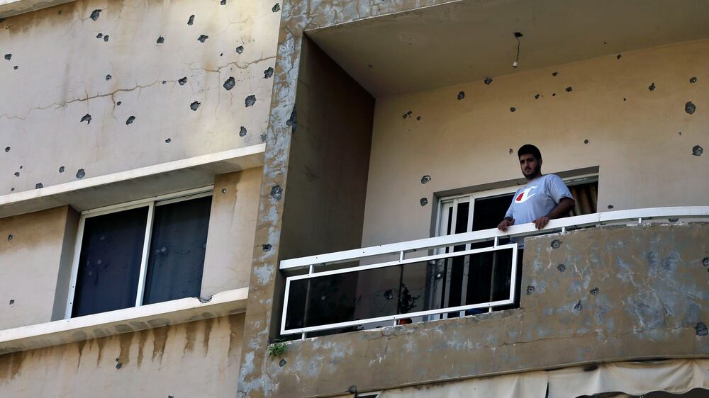 Residents assess the damage after deadly Beirut clashes
