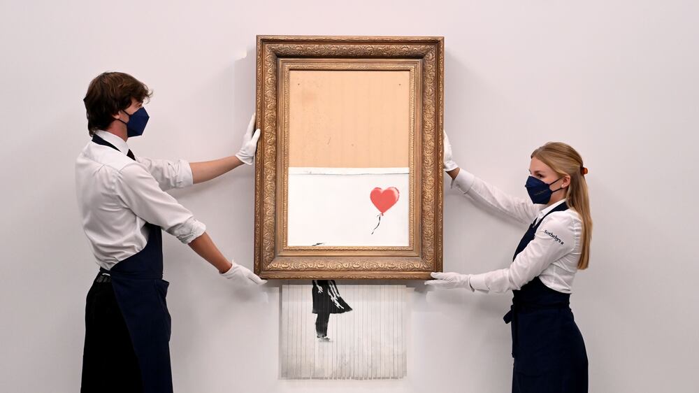 Half-shredded Banksy artwork sells for $25m