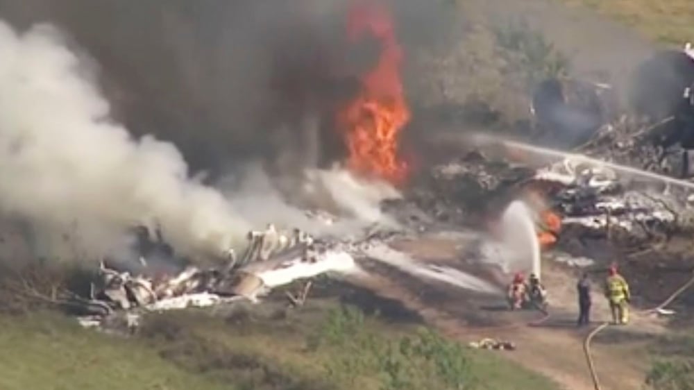 Plane runs off Texas runway and bursts into flames