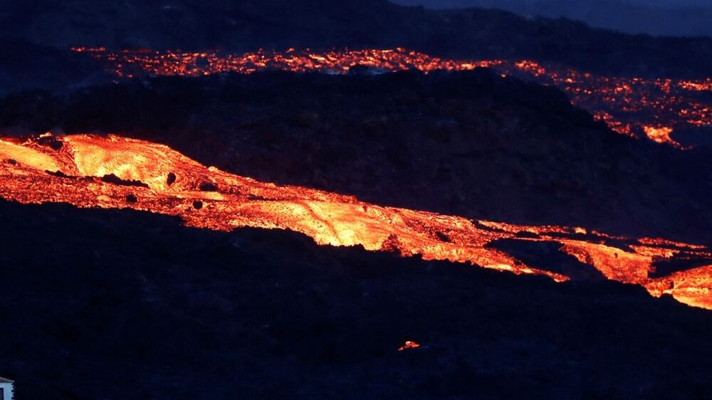 Evacuation of La Palma continues as molten rock flows through towns