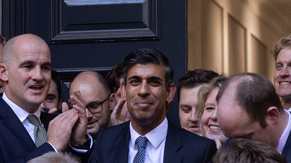 Hugs and applause for Rishi Sunak at Tory HQ