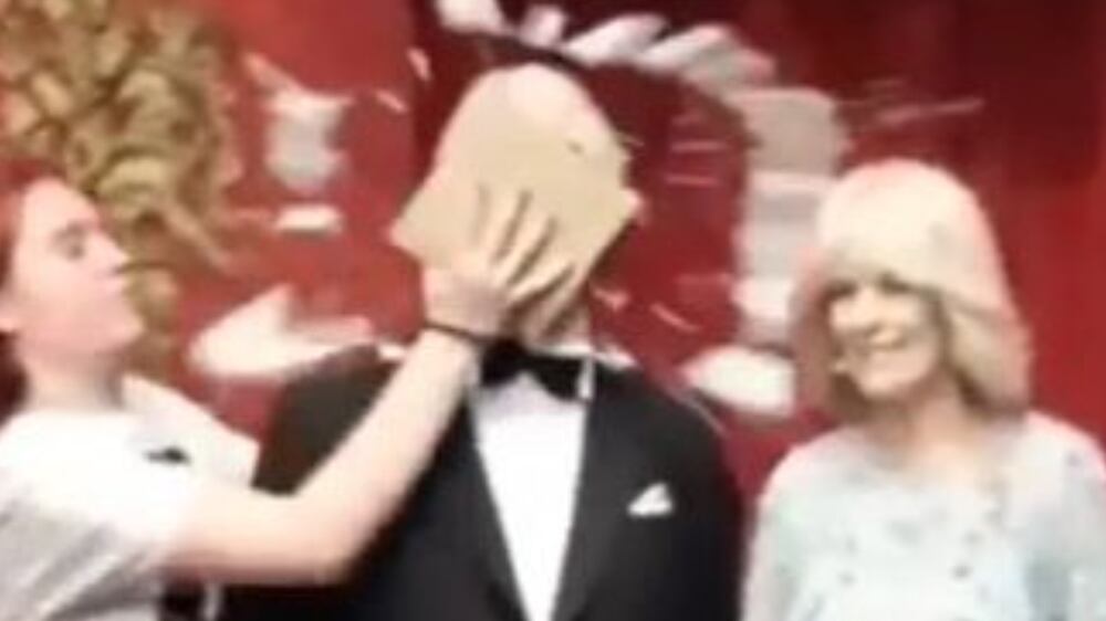 BEST QUALITY AVAILABLE Screen grab taken from a handout video issued by Just Stop Oil of two activists throwing chocolate cake on a waxwork model of King Charles III at Madam Tussauds in London. Issue date: Monday October 24, 2022.