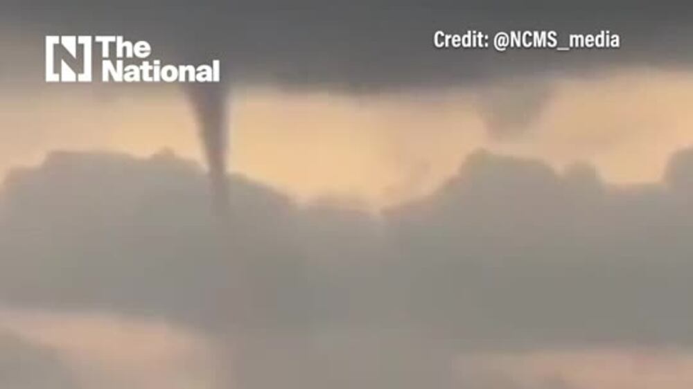 Dramatic moment of a waterspout twisting off Fujairah coast