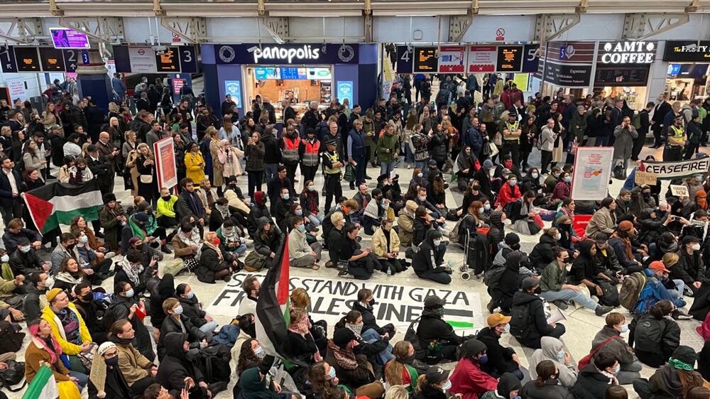 Pro-Palestine activists stage sit-in at London’s Liverpool St station demanding ceasefire