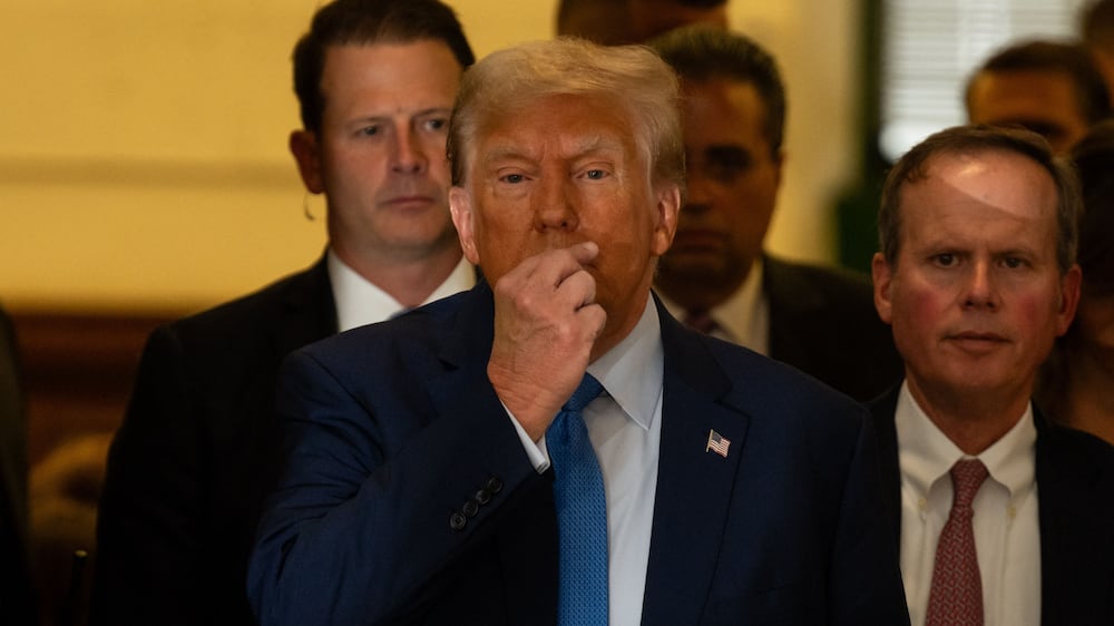 Donald Trump zips his lips after testifying in civil case