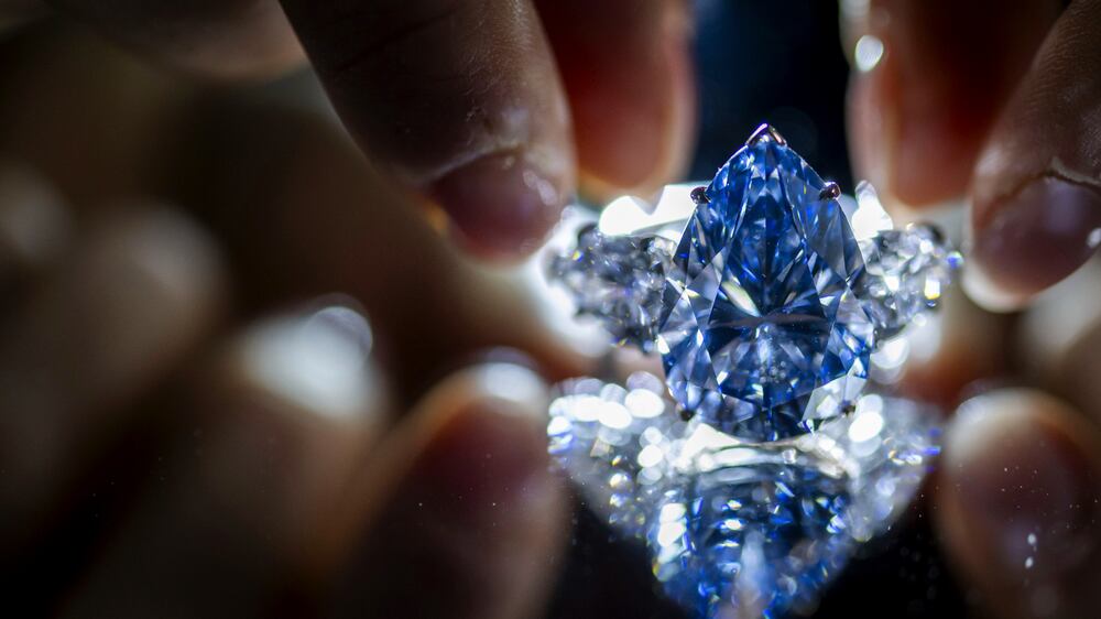 Blue diamond sells for about $44 million at auction