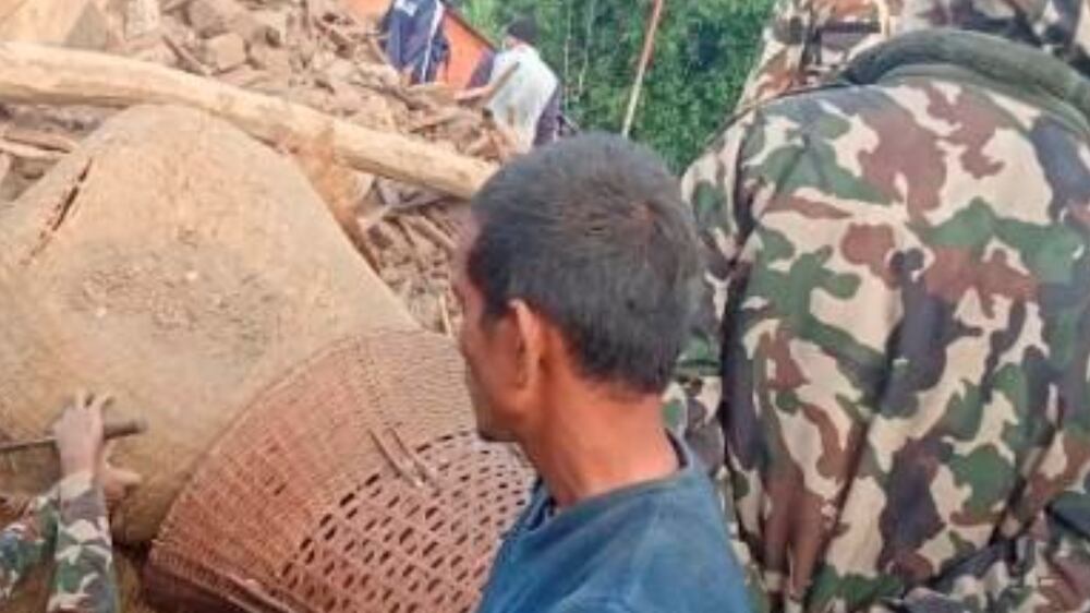 Members of the Nepal army work during a rescue operation at the ruins of a collapsed house, damaged after an earthquake struck early Wednesday, in the western district of Doti, Nepal November 9, 2022.  Nepal Army/Handout via REUTERS THIS IMAGE HAS BEEN SUPPLIED BY A THIRD PARTY.  NO RESALES.  NO ARCHIVES