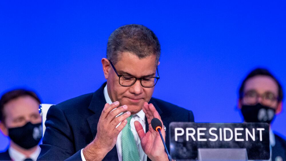 Cop26 president's voice breaks as he apologises for last minute deal changes