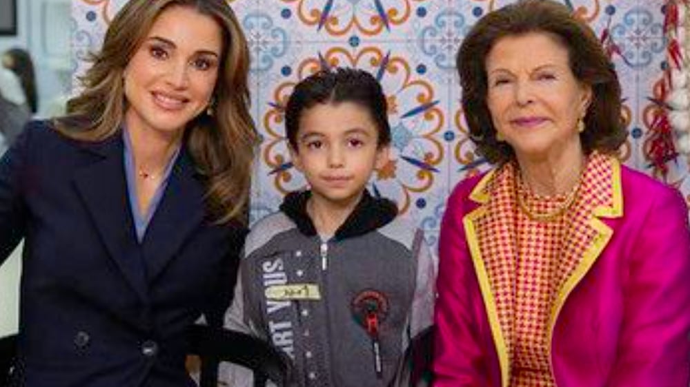 Jordan's Queen Rania and Queen Silvia of Sweden meet children at family centre