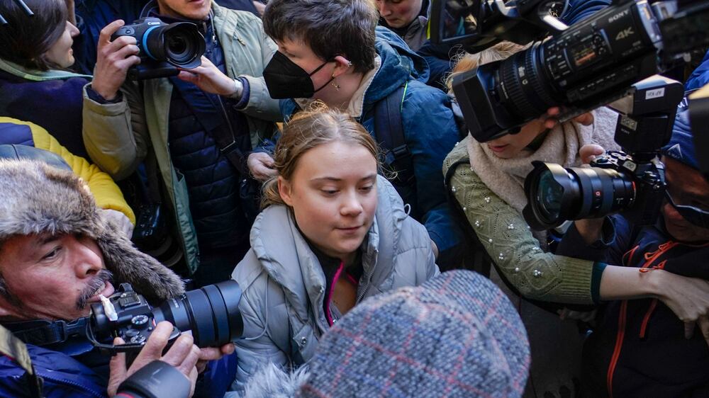 Climate activist Greta Thunberg arrives at court in London