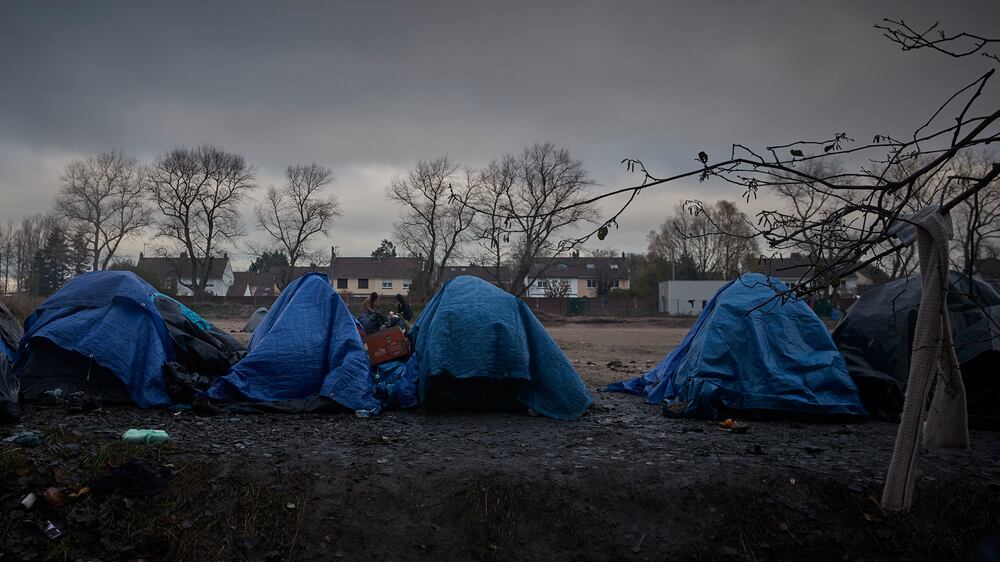 CALAIS, FRANCE - NOVEMBER 27: Tents at a migrant camp in on the outskirts of Calais on November 27, 2021 in Calais, France. There currently around 1800 migrants and refugees currently living outside in Northern France. At least 27 people including five women and a young girl died on Wednesday trying to cross the Channel to the UK in an inflatable dinghy in an incident in which the International Organisation for Migration described as the biggest single loss of life in the Channel since it began collecting data in 2014. (Photo by Kiran Ridley / Getty Images)