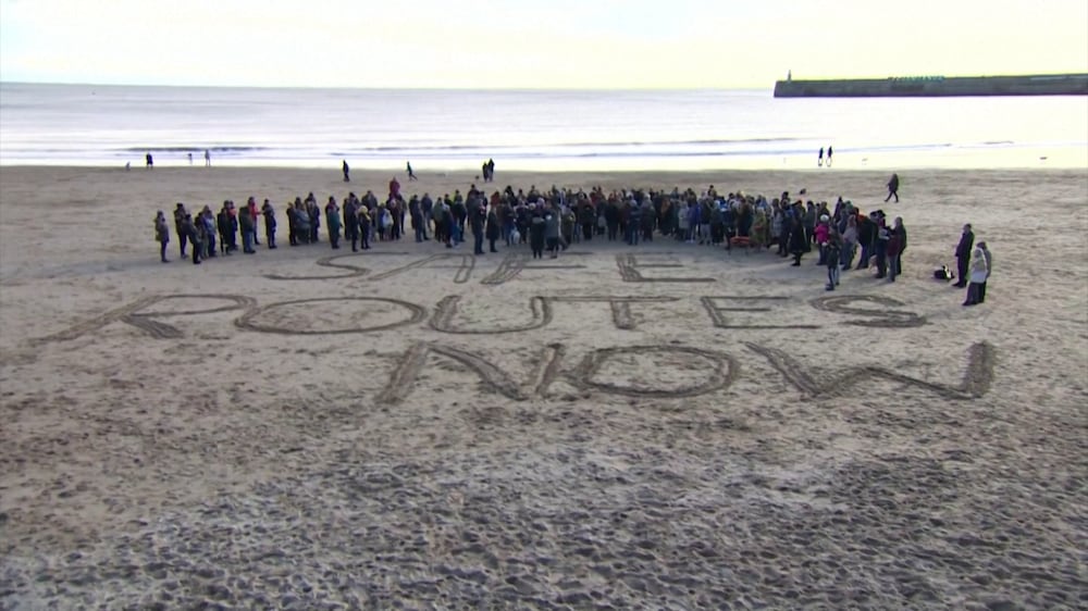 Vigil held in Folkestone to honour the 27 people who died crossing the Channel