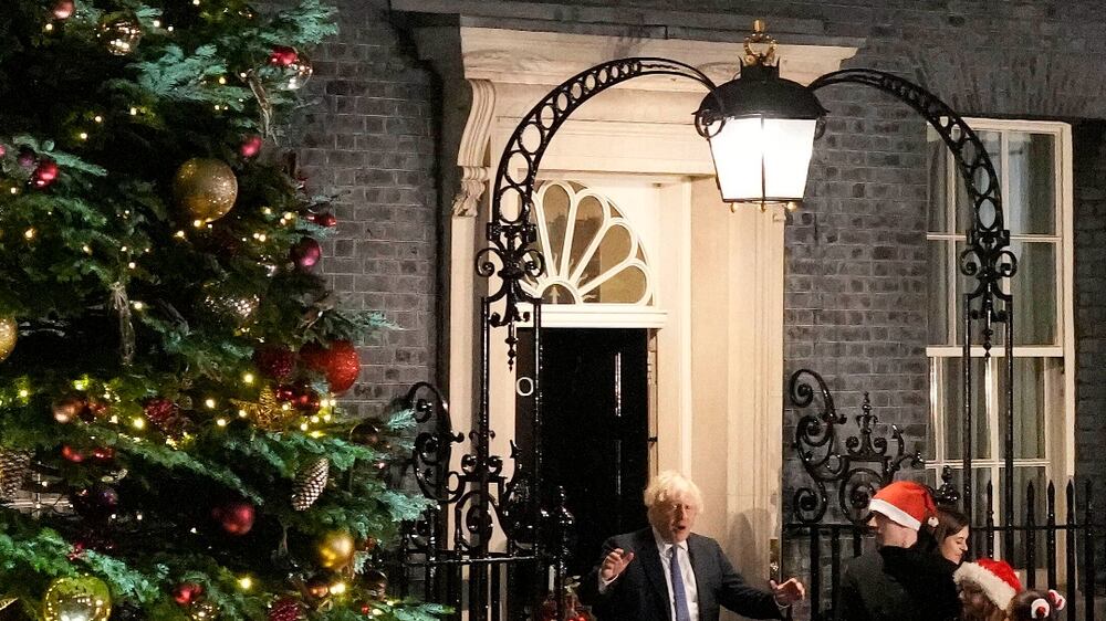 UK prime minister lights up Downing Street Christmas tree