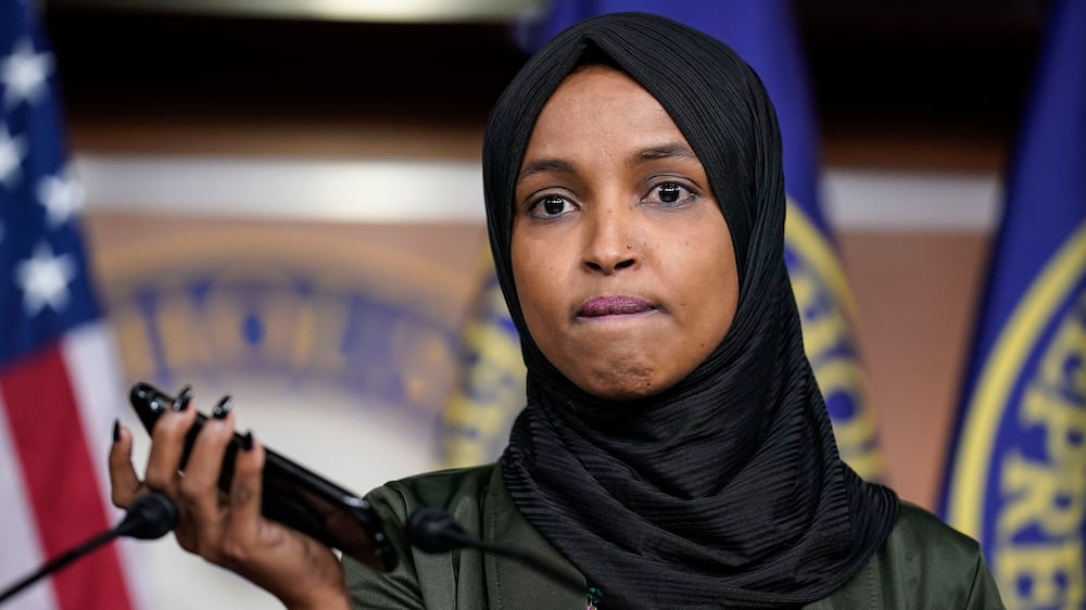 Rep.  Ilhan Omar, D-Minn. , plays a recording of a death threat left on her voicemail in the wake of anti-Islamic comments made last week by Rep.  Lauren Boebert, R-Colo. , who likened Omar to a bomb-carrying terrorist, during a news conference at the Capitol in Washington, Tuesday, Nov.  30, 2021.  (AP Photo/J.  Scott Applewhite)
