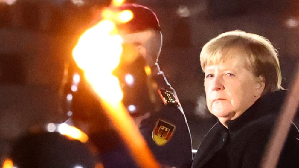 Germany's outgoing Chancellor Angela Merkel attends a Grand Tattoo of the German armed forces Bundeswehr at the Defence Ministry in Berlin, Germany, December 2, 2021.  REUTERS / Fabrizio Bensch     TPX IMAGES OF THE DAY