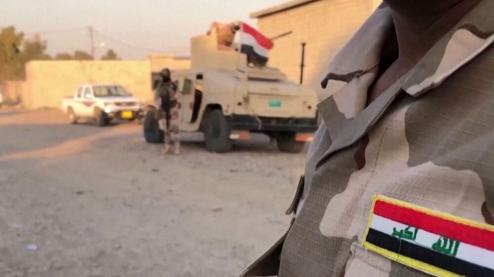 Iraqi forces and Peshmerga fighters retake village from ISIS