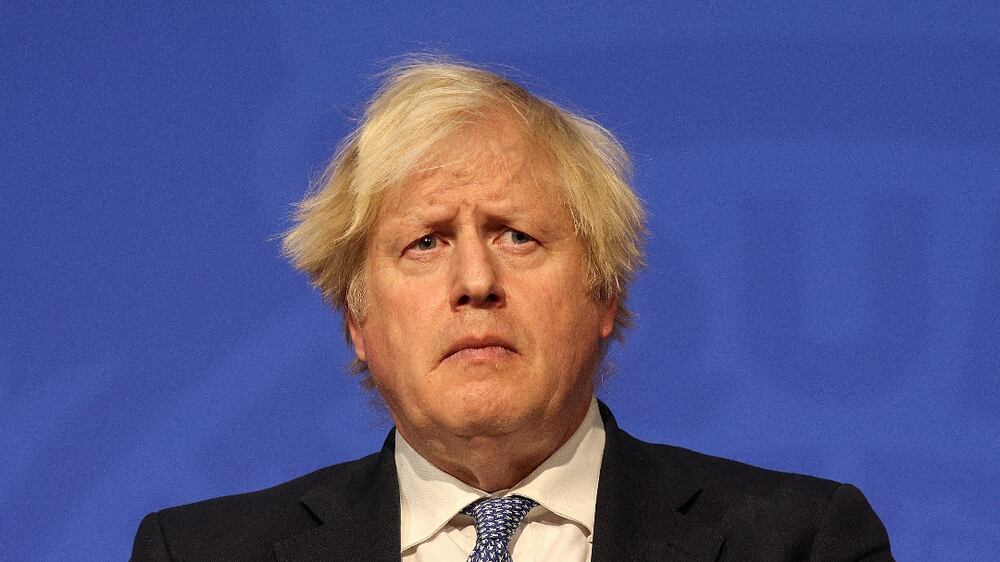 Boris Johnson tells people to work from home to slow Omicron spread
