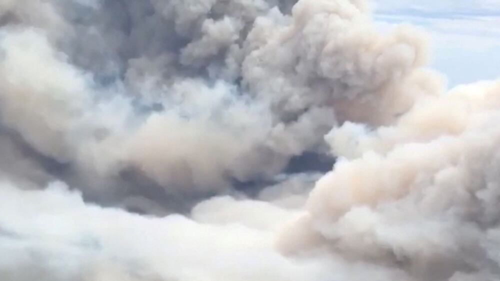 Heavy smoke fills the sky as bushfires in Western Australia rage on