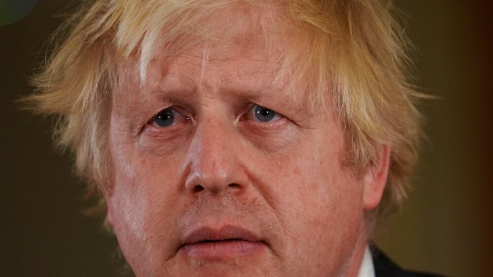UK's Boris Johnson warns of Omicron 'tidal wave', says two doses not enough